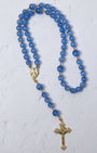 Bluebell rosary featuring delicate blue agate beads with gold-toned metal accents and a detailed cross pendant