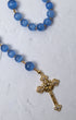 Bluebell rosary with blue matte agate beads gold-toned spacers and gold cross pendant with clear crystals