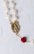 Ivory Rose Pearl Rosary gold-toned with white pearls, ornate religious medallion, and vibrant red rose accent