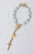 Light blue jade rosary bracelet with gold metal accents virgin mary medallion and ornate cross rose charm car use