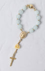 Light blue jade rosary bracelet with gold metal accents virgin mary medallion and ornate cross rose charm car use