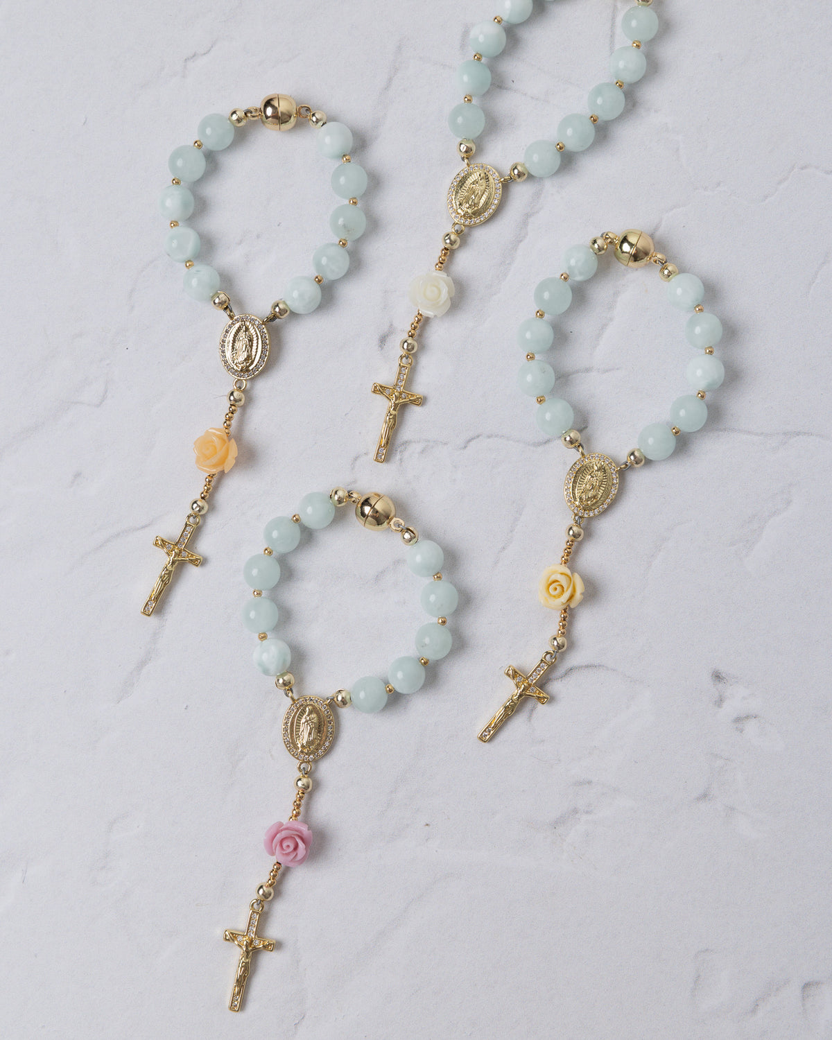 Light blue jade bead rosary bracelet with gold-toned crosses and rose charms for st thereses rose garden car rosary
