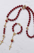 Elegant red agate sacred heart steering wheel rosary set with gold-toned metal accents and heart-shaped centerpiece