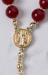 Red agate beads with gold-toned saint benedict medal form a sacred heart steering wheel rosary for prayer use