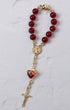 Sacred Heart steering wheel rosary with red agate beads gold-toned metal accents and heart-shaped crystal pendant