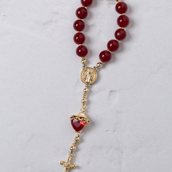 Sacred Heart steering wheel rosary with red agate beads gold-toned metal accents and heart-shaped crystal pendant