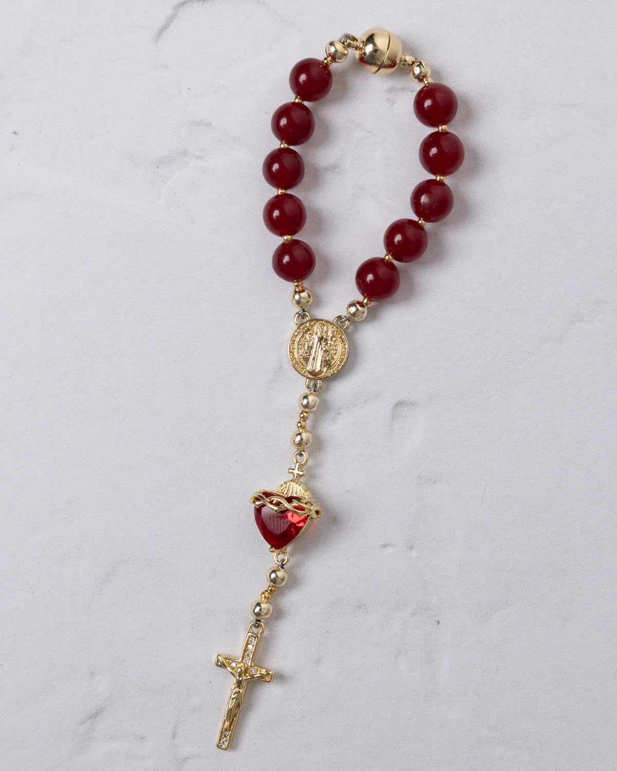 Sacred Heart steering wheel rosary with red agate beads gold-toned metal accents and heart-shaped crystal pendant