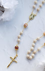 Soft Glory Rosary with cream beads, rose quartz, and gold crucifix