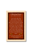 Framed St. Therese of Lisieux holy card with red background and morning prayer text