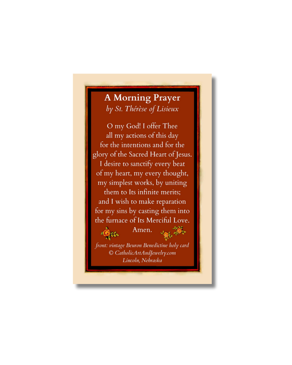 Framed St. Therese of Lisieux holy card with red background and morning prayer text