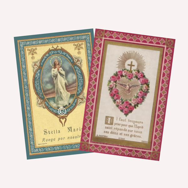 Two vintage-style religious prayer cards, one featuring an oval portrait of the virgin mary with ornate teal and gold borders, and another displaying a heart wreathed in pink roses above a dove against a red patterned border.