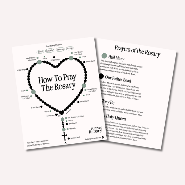 White printed rosary prayer guide with black text and a heart-shaped outline of beads.