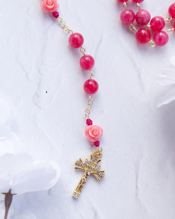 The Little Flower Rosary with pink glossy beads and gold crucifix