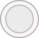 Black circular object with a smooth, solid surface.